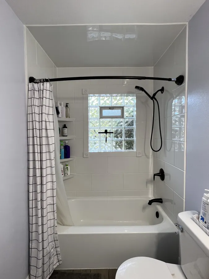 Tub to Tub Conversion Menomonee Falls WI oil rubbed bronze white large tile pattern