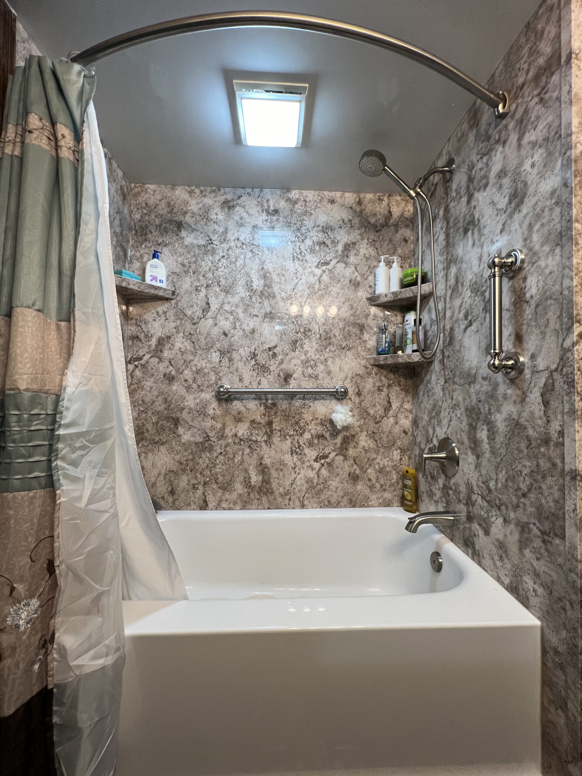 New bathtub remodel with granite look surround