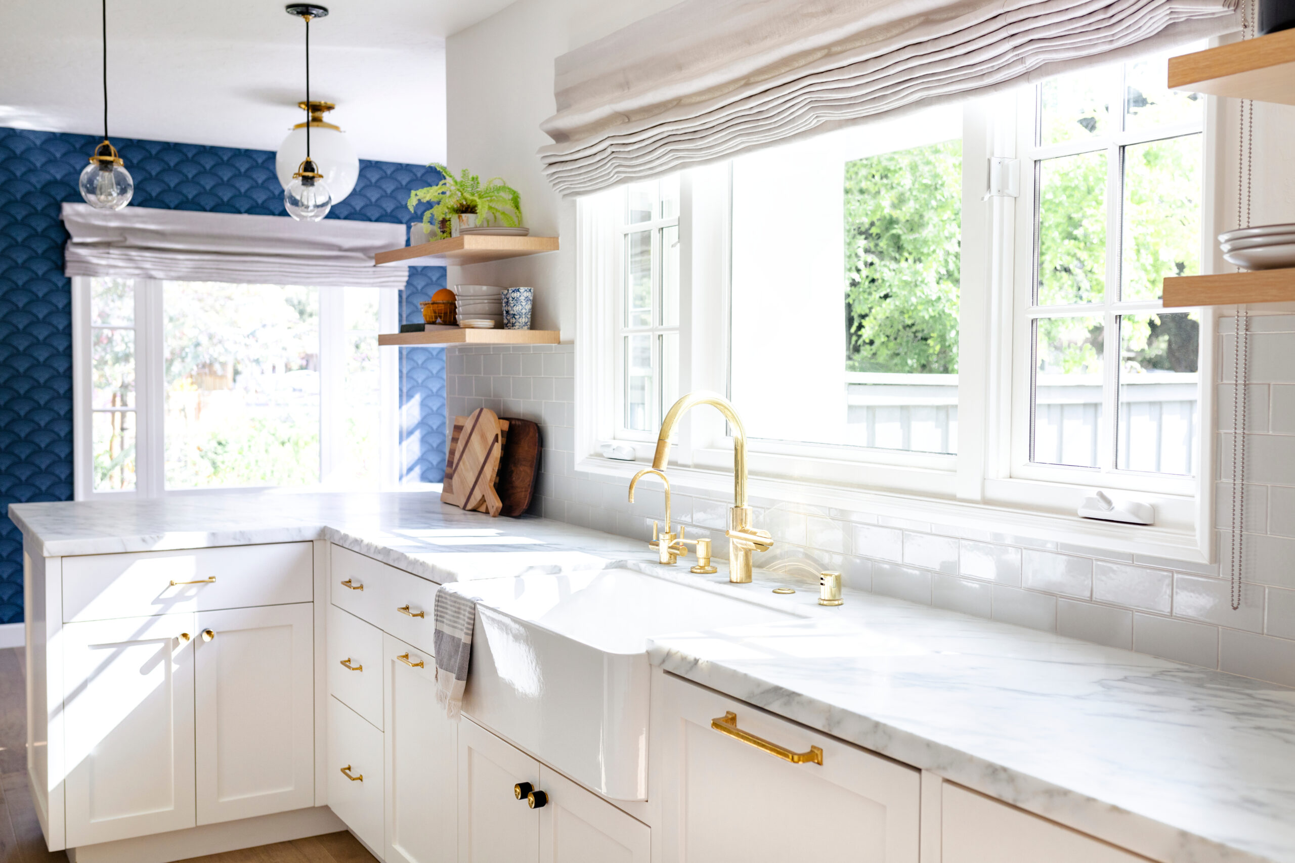 New kitchen windows, countertops gold accents