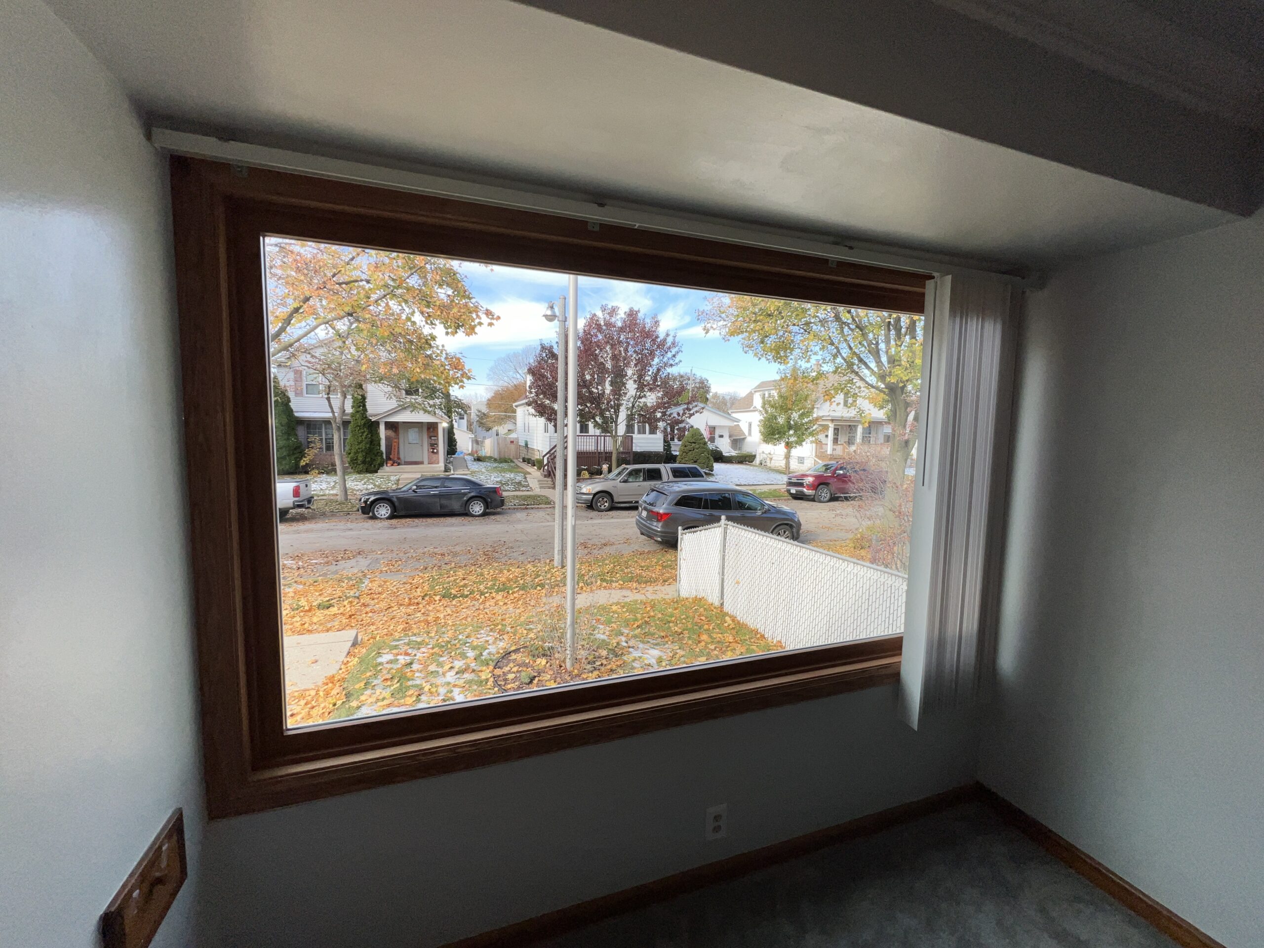 Large picture window looking at street